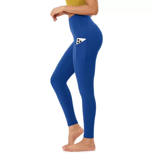 imageODODOS Womens High Waisted Yoga Leggings with Pockets Tummy Control Non See Through Workout Athletic Running Yoga PantsRoyal Blue
