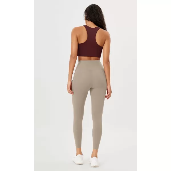 imageODODOS Womens High Waisted Yoga Leggings with Pockets Tummy Control Non See Through Workout Athletic Running Yoga PantsShaker Beige