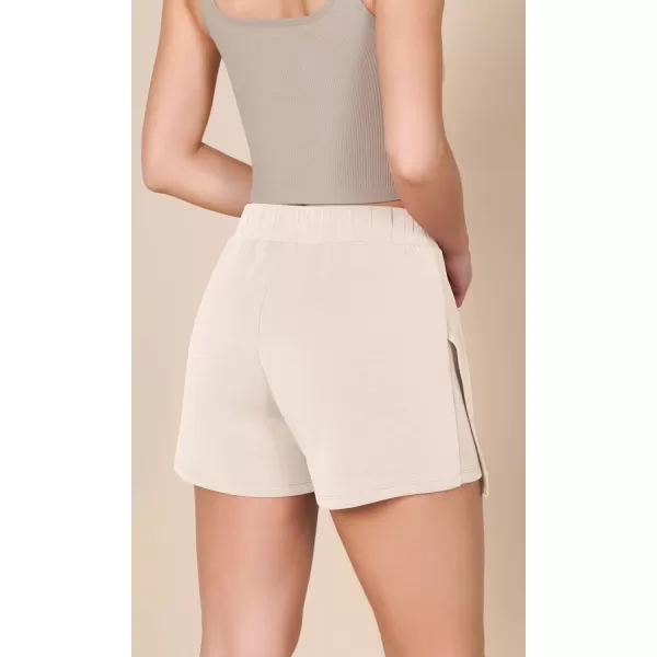 imageODODOS Modal Soft Wrap Mini Skorts with Pocket for Women High Waist Asymmetrical Hem Relaxed ShortsBeige