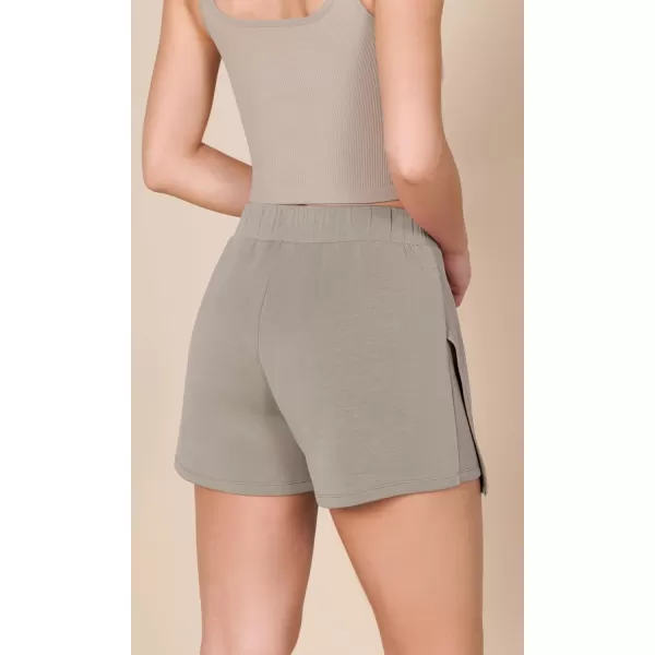 imageODODOS Modal Soft Wrap Mini Skorts with Pocket for Women High Waist Asymmetrical Hem Relaxed ShortsKhaki