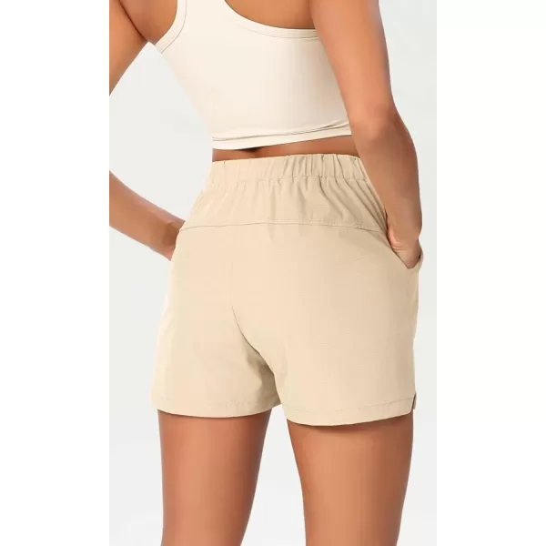 imageODODOS Stretch Woven Relaxed Shorts for Women Elastic High Waist Summer Lightweight Casual Shorts with PocketsBeige
