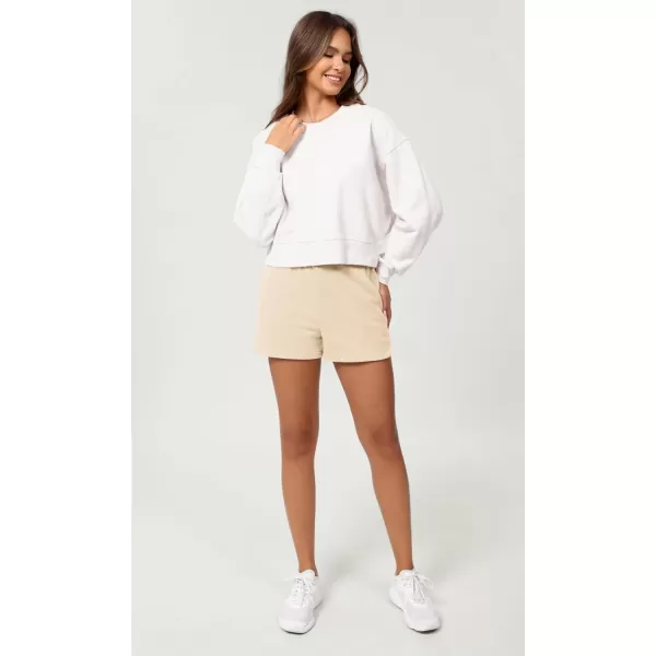 imageODODOS Womens Sweat Shorts Cotton French Terry Curved Hem Workout Casual Relaxed Lounge Shorts with PocketsBeige