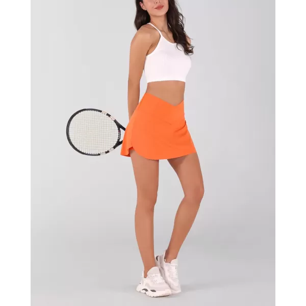 imageODODOS Womens Tennis Skirts with Pockets Crossover High Waist Builtin Shorts Athletic Golf SkortsPapaya