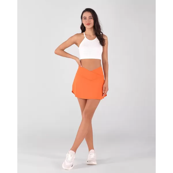 imageODODOS Womens Tennis Skirts with Pockets Crossover High Waist Builtin Shorts Athletic Golf SkortsPapaya
