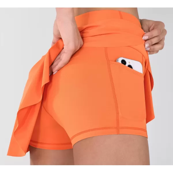 imageODODOS Womens Tennis Skirts with Pockets Crossover High Waist Builtin Shorts Athletic Golf SkortsPapaya