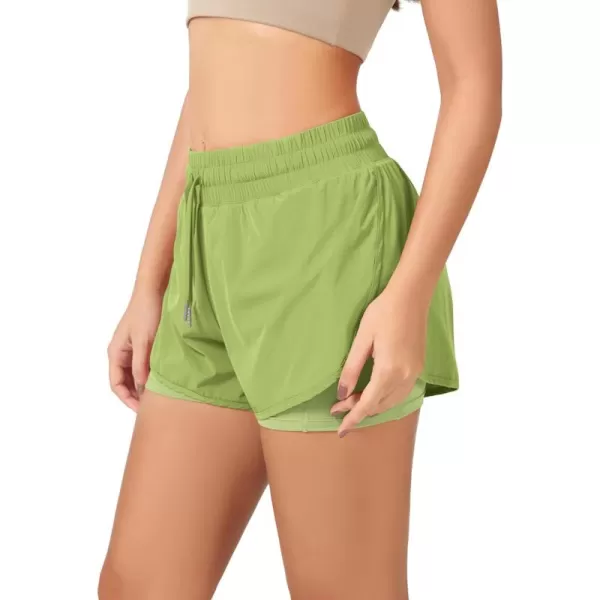 imageODODOS 2 in1 Athletic Shorts for Women High Waist Dolphin Split Workout Running Shorts with PocketsLime Green