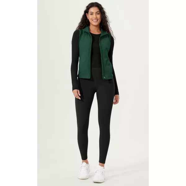 imageODODOS Womens Padded Vest with Pockets Athletic Stand Collar Sleeveless Warm Outerwear Zip Up GiletGreen