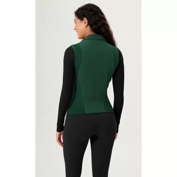 imageODODOS Womens Padded Vest with Pockets Athletic Stand Collar Sleeveless Warm Outerwear Zip Up GiletGreen