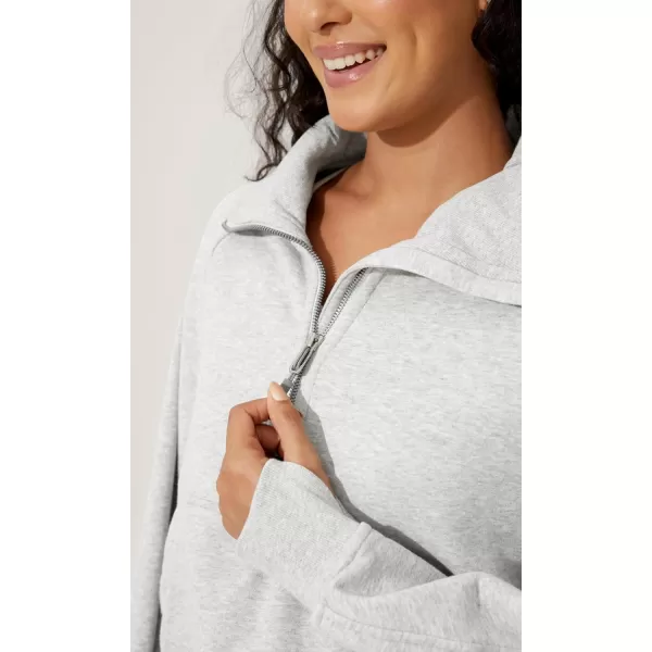 imageODODOS Half Zipper Sweatshirts for Women Funnel Neck Fleece Lined Oversize Hoodies Cropped Pullover with Thumb HoleHeather White