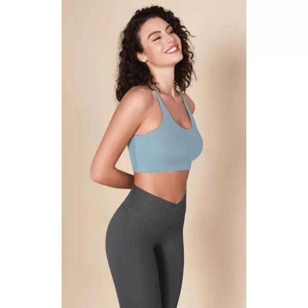 imageODODOS Halter Sports Bra for Women Non Padded Strappy Cropped Tops Workout Yoga CropChambray