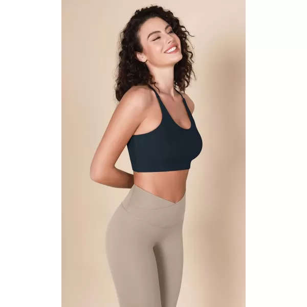 imageODODOS Halter Sports Bra for Women Non Padded Strappy Cropped Tops Workout Yoga CropDeep Navychambray