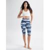 imageODODOS Womens High Waisted Yoga Capris with Pockets Tummy Control Non See Through Workout Athletic Running Capri LeggingsBlue Waves