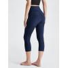 imageODODOS Womens High Waisted Yoga Capris with Pockets Tummy Control Non See Through Workout Athletic Running Capri LeggingsTie Dye Blue Navy