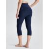 imageODODOS Womens High Waisted Yoga Capris with Pockets Tummy Control Non See Through Workout Athletic Running Capri LeggingsTie Dye Blue Navy