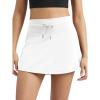 imageODODOS Womens Drawstring Tie Daily Skirts Builtin Shorts Athletic Golf Tennis Skorts with Ball PocketWhite