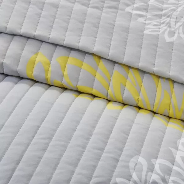 Comfort Spaces Enya Quilt Set  Casual Floral Print Channel Stitching Design All Season Lightweight Coverlet Cozy Bedding Matching Shams Decorative Pillows FullQueen90quotx90quot Purple 3 PieceYellowGrey