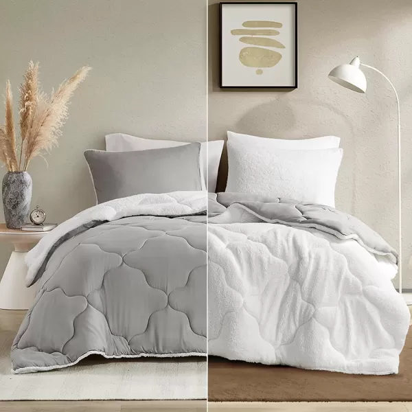 Comfort Spaces Vixie Reversible Comforter Set  Trendy Vibrant Color with Geometric Quilted Cover Lightweight All Season Down Alternative Cozy Bedding Sham NavyCharcoal TwinTwin XL 2 pieceGreyWhite Sherpa