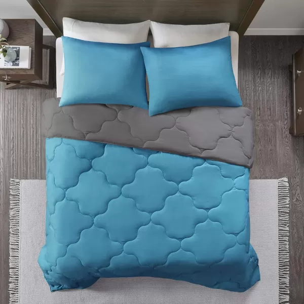 Comfort Spaces Vixie Reversible Comforter Set  Trendy Vibrant Color with Geometric Quilted Cover Lightweight All Season Down Alternative Cozy Bedding Sham NavyCharcoal TwinTwin XL 2 pieceTealDark Gray