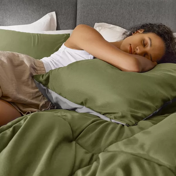 Comfort Spaces Vixie Reversible Comforter Set  Trendy Vibrant Color with Geometric Quilted Cover Lightweight All Season Down Alternative Cozy Bedding Sham NavyCharcoal TwinTwin XL 2 pieceGreenGrey