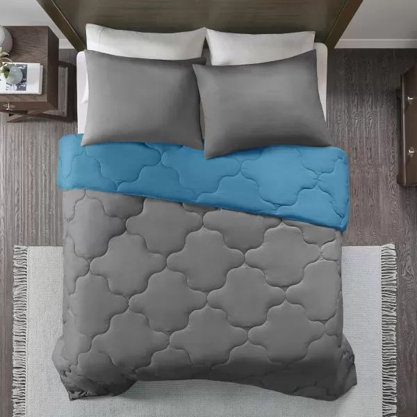 Comfort Spaces Vixie Reversible Comforter Set  Trendy Vibrant Color with Geometric Quilted Cover Lightweight All Season Down Alternative Cozy Bedding Sham NavyCharcoal TwinTwin XL 2 pieceTealCharcoal