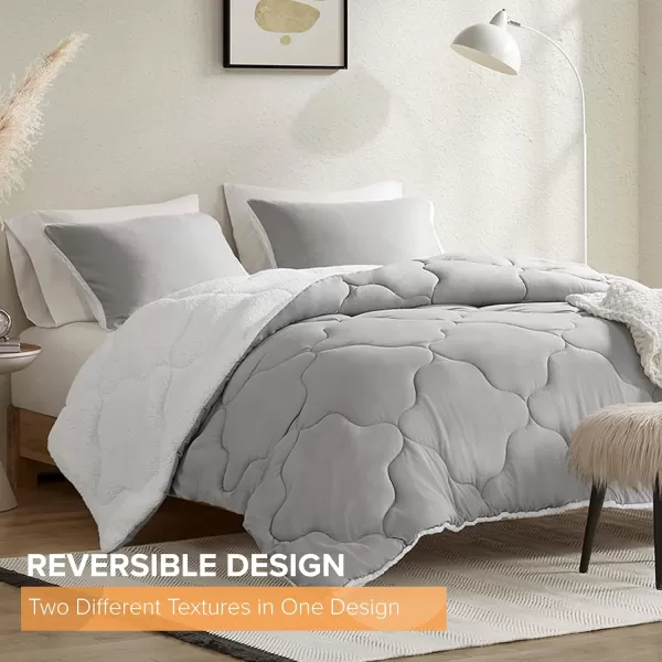 Comfort Spaces Vixie Reversible Comforter Set  Trendy Vibrant Color with Geometric Quilted Cover Lightweight All Season Down Alternative Cozy Bedding Sham NavyCharcoal TwinTwin XL 2 pieceGreyWhite Sherpa