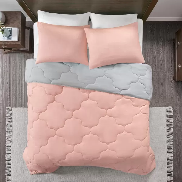 Comfort Spaces Vixie Reversible Comforter Set  Trendy Vibrant Color with Geometric Quilted Cover Lightweight All Season Down Alternative Cozy Bedding Sham NavyCharcoal TwinTwin XL 2 pieceCoralGray
