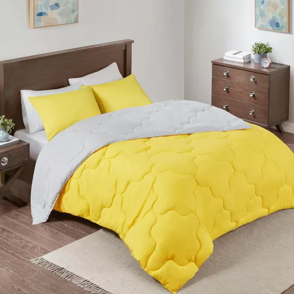 Comfort Spaces Vixie Reversible Comforter Set  Trendy Vibrant Color with Geometric Quilted Cover Lightweight All Season Down Alternative Cozy Bedding Sham NavyCharcoal TwinTwin XL 2 pieceGreyYellow