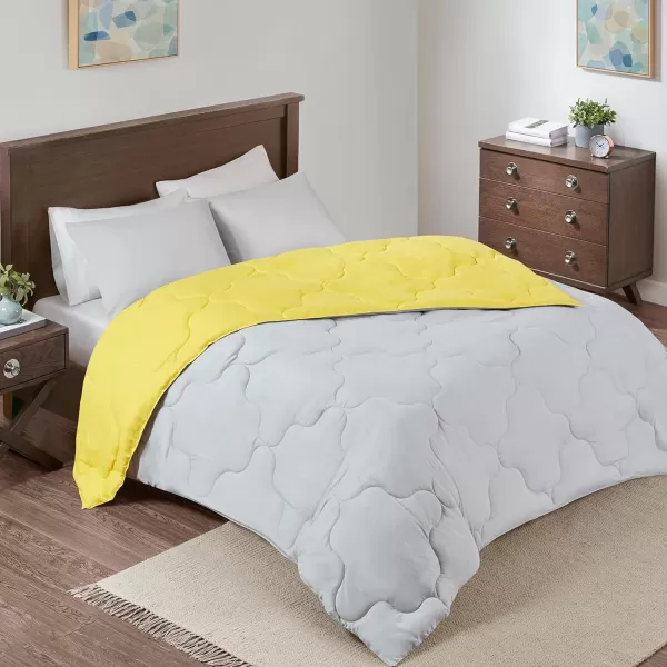 Comfort Spaces Vixie Reversible Comforter Set  Trendy Vibrant Color with Geometric Quilted Cover Lightweight All Season Down Alternative Cozy Bedding Sham NavyCharcoal TwinTwin XL 2 pieceGreyYellow