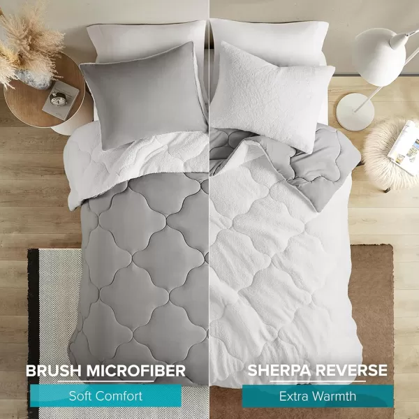 Comfort Spaces Vixie Reversible Comforter Set  Trendy Vibrant Color with Geometric Quilted Cover Lightweight All Season Down Alternative Cozy Bedding Sham NavyCharcoal TwinTwin XL 2 pieceGreyWhite Sherpa