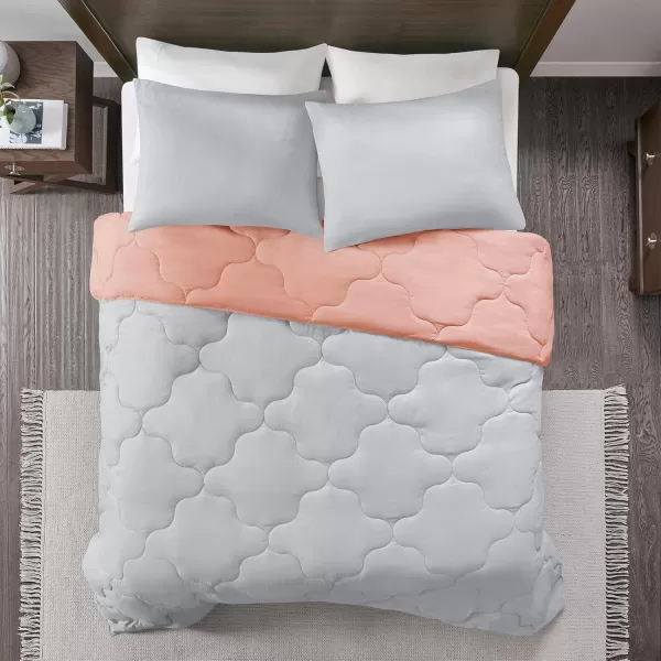 Comfort Spaces Vixie Reversible Comforter Set  Trendy Vibrant Color with Geometric Quilted Cover Lightweight All Season Down Alternative Cozy Bedding Sham NavyCharcoal TwinTwin XL 2 pieceCoralGray
