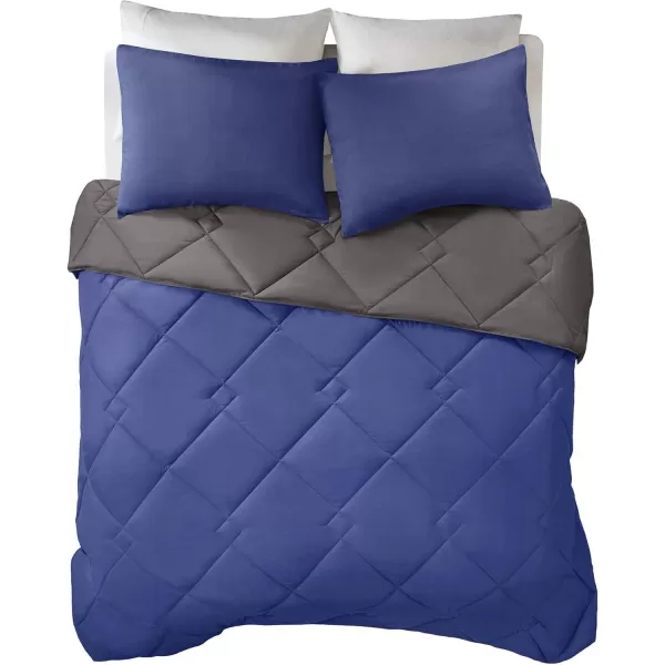 Comfort Spaces Vixie Reversible Comforter Set  Trendy Vibrant Color with Geometric Quilted Cover Lightweight All Season Down Alternative Cozy Bedding Sham NavyCharcoal TwinTwin XL 2 pieceNavyCharcoal