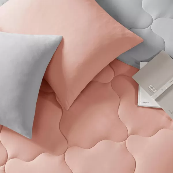 Comfort Spaces Vixie Reversible Comforter Set  Trendy Vibrant Color with Geometric Quilted Cover Lightweight All Season Down Alternative Cozy Bedding Sham NavyCharcoal TwinTwin XL 2 pieceCoralGray