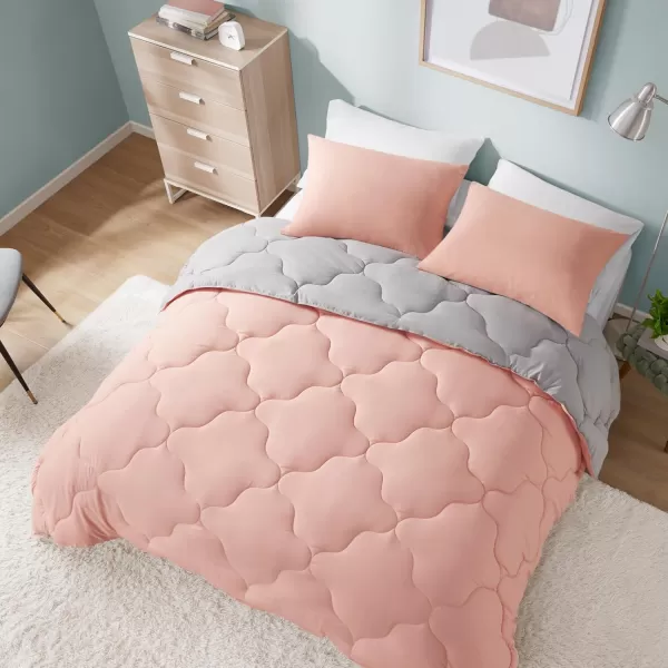 Comfort Spaces Vixie Reversible Comforter Set  Trendy Vibrant Color with Geometric Quilted Cover Lightweight All Season Down Alternative Cozy Bedding Sham NavyCharcoal TwinTwin XL 2 pieceCoralGray