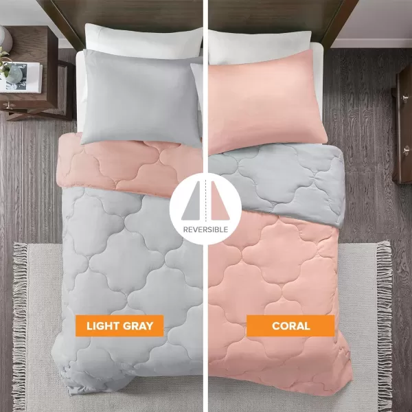 Comfort Spaces Vixie Reversible Comforter Set  Trendy Vibrant Color with Geometric Quilted Cover Lightweight All Season Down Alternative Cozy Bedding Sham NavyCharcoal TwinTwin XL 2 pieceCoralGray