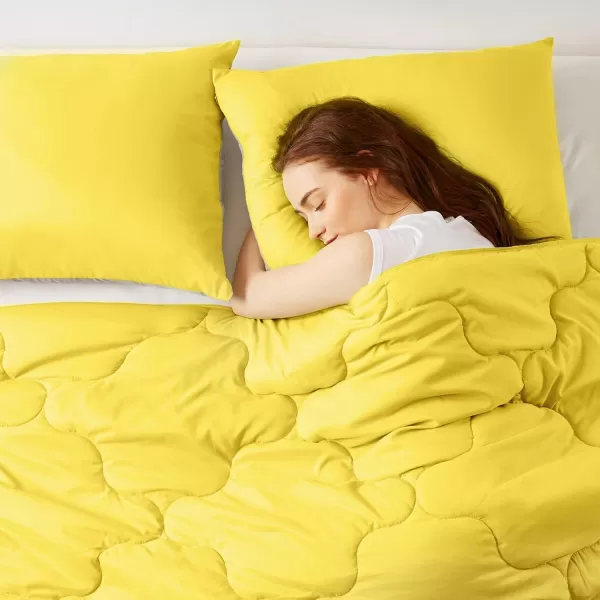 Comfort Spaces Vixie Reversible Comforter Set  Trendy Vibrant Color with Geometric Quilted Cover Lightweight All Season Down Alternative Cozy Bedding Sham NavyCharcoal TwinTwin XL 2 pieceGreyYellow