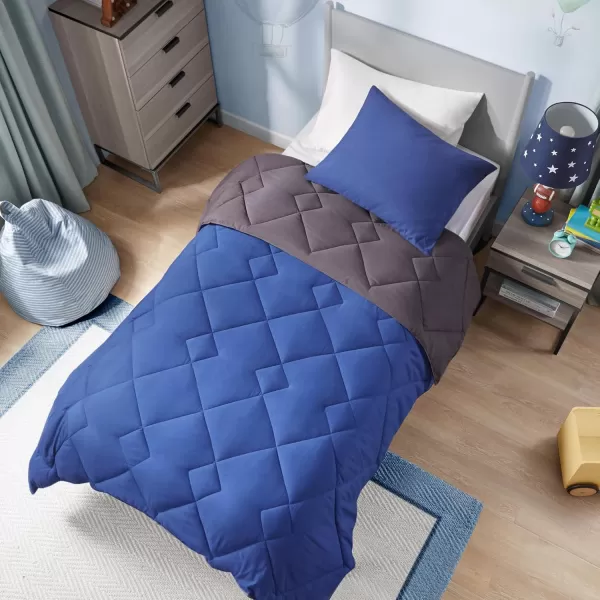 Comfort Spaces Vixie Reversible Comforter Set  Trendy Vibrant Color with Geometric Quilted Cover Lightweight All Season Down Alternative Cozy Bedding Sham NavyCharcoal TwinTwin XL 2 pieceNavyCharcoal