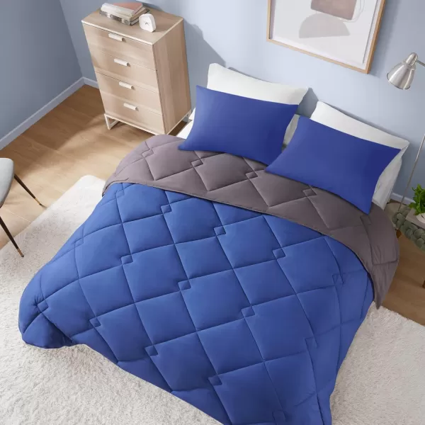 Comfort Spaces Vixie Reversible Comforter Set  Trendy Vibrant Color with Geometric Quilted Cover Lightweight All Season Down Alternative Cozy Bedding Sham NavyCharcoal TwinTwin XL 2 pieceNavyCharcoal