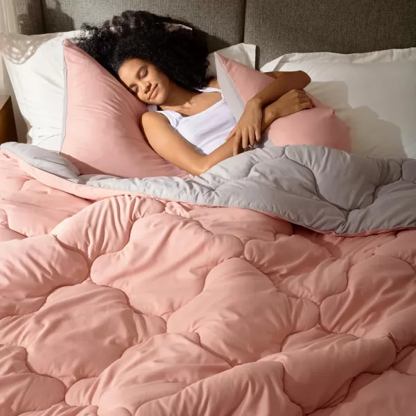 Comfort Spaces Vixie Reversible Comforter Set  Trendy Vibrant Color with Geometric Quilted Cover Lightweight All Season Down Alternative Cozy Bedding Sham NavyCharcoal TwinTwin XL 2 pieceCoralGray