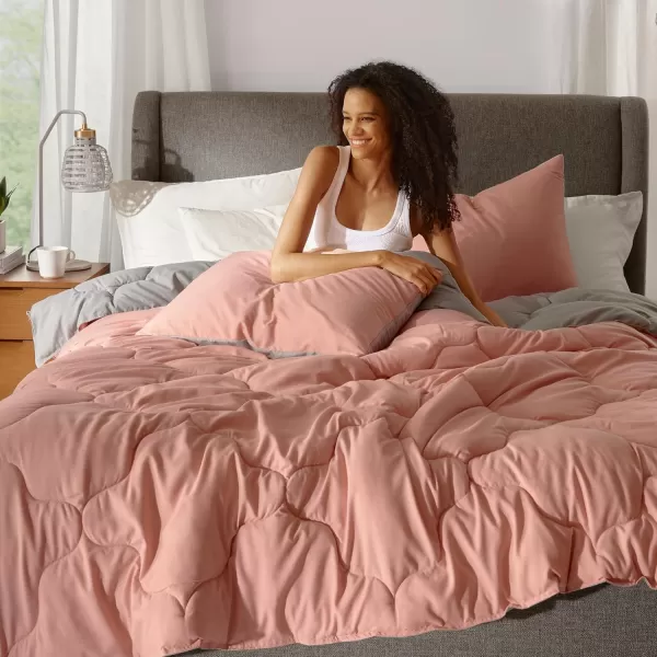 Comfort Spaces Vixie Reversible Comforter Set  Trendy Vibrant Color with Geometric Quilted Cover Lightweight All Season Down Alternative Cozy Bedding Sham NavyCharcoal TwinTwin XL 2 pieceCoralGray