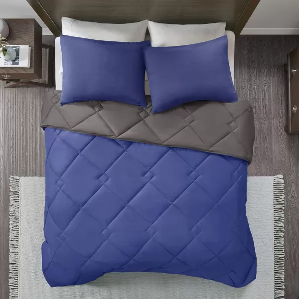 Comfort Spaces Vixie Reversible Comforter Set  Trendy Vibrant Color with Geometric Quilted Cover Lightweight All Season Down Alternative Cozy Bedding Sham NavyCharcoal TwinTwin XL 2 pieceNavyCharcoal