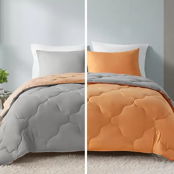 Comfort Spaces Vixie Reversible Comforter Set  Trendy Vibrant Color with Geometric Quilted Cover Lightweight All Season Down Alternative Cozy Bedding Sham NavyCharcoal TwinTwin XL 2 pieceOrangeGrey