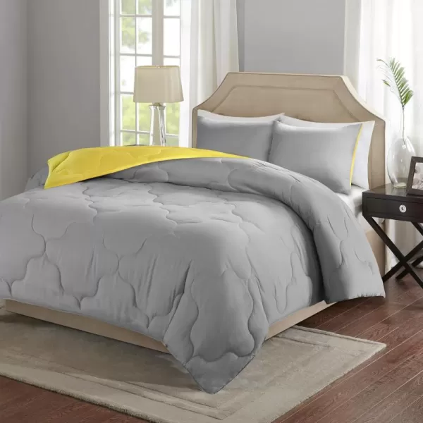 Comfort Spaces Vixie Reversible Comforter Set  Trendy Vibrant Color with Geometric Quilted Cover Lightweight All Season Down Alternative Cozy Bedding Sham NavyCharcoal TwinTwin XL 2 pieceGreyYellow