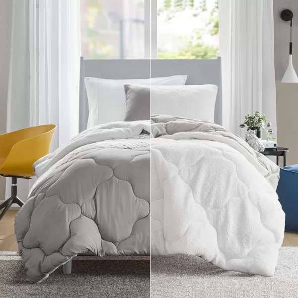 Comfort Spaces Vixie Reversible Comforter Set  Trendy Vibrant Color with Geometric Quilted Cover Lightweight All Season Down Alternative Cozy Bedding Sham NavyCharcoal TwinTwin XL 2 pieceGreyWhite Sherpa
