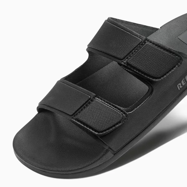 imageREEF Cushion Tradewind Mens Fashion Slides Adjustable Velcro Straps Ultra Soft Cushion Footbed Arch SupportBlack