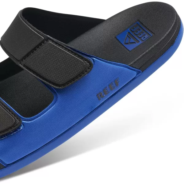 imageREEF Cushion Tradewind Mens Fashion Slides Adjustable Velcro Straps Ultra Soft Cushion Footbed Arch SupportBlackBlueBlack