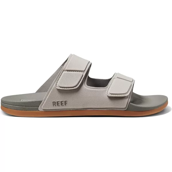 imageREEF Cushion Tradewind Mens Fashion Slides Adjustable Velcro Straps Ultra Soft Cushion Footbed Arch SupportDoveTobacco
