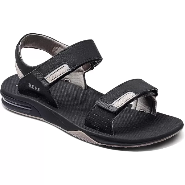 imageReef Mens Fanning Baja Bottle Opener SandalBlackTanReflect