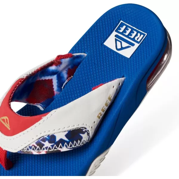 imageREEF Kids Fanning Flip Flop Arch Support Durable Outsole Water FriendlyRed White and Blue