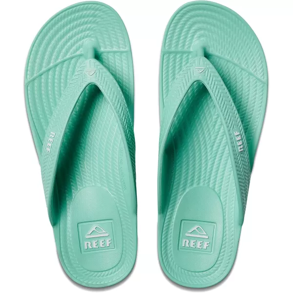 imageREEF Water Court Womens Beach Flip Flop Soft Cushion Footbed Water Friendly Arch SupportNeon Teal