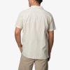 imageREEF Mens Woven Poplin Short Sleeve TeeAlmond Milk Lemmy